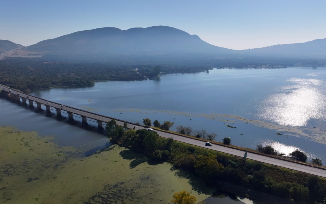 Aerial view of Hartbeespoort Dam with the Magaliesberg behind it